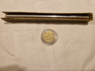 Dos jeringuillas y un termómetro antiguos