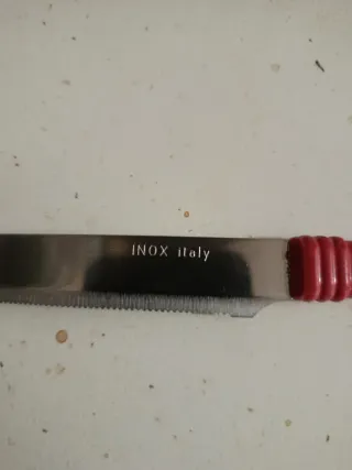 Set coltelli e cucchiaini manico rosso