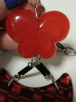 Collar largo geométrico tonos rojos y plateado