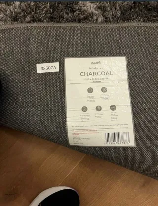 Alfombra gris de tela