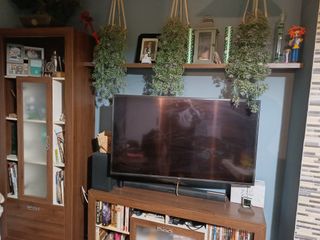 Mueble de salón madera y cristal