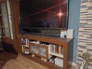 Mueble de salón madera y cristal