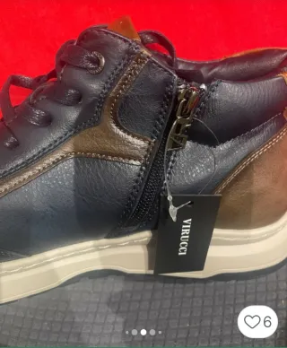 Botines de hombre , cordones y cremallera.