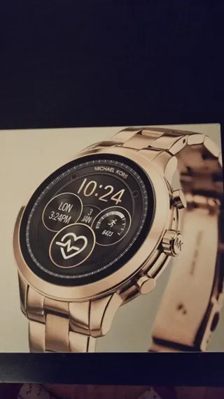 Smartwatch Micharl Kors con 3 correas de recambio.