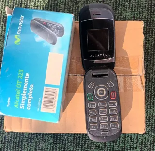 MÓVIL,CAJA,CARGADOR,MANUAL. Alcatel OT 223