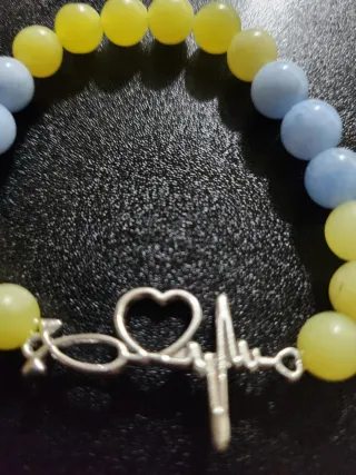 Pulsera con dije de latido y corazón