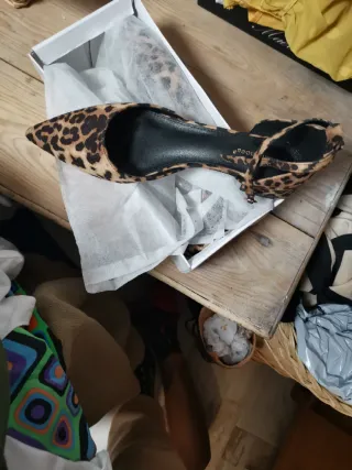 Zapatos planos con estampado de leopardo