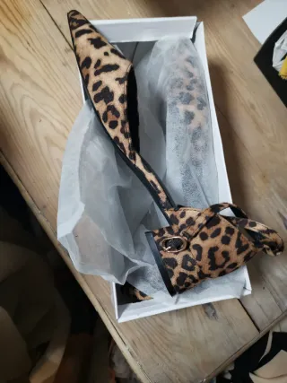 Zapatos planos con estampado de leopardo