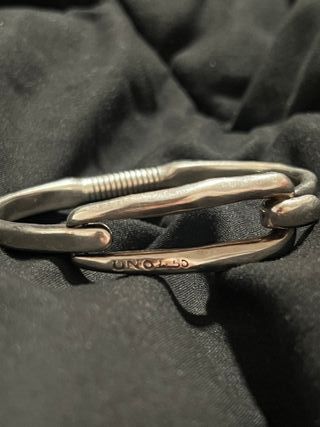 Pulsera Amarrado UNOde50 Bañada En Plata