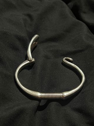 Pulsera Amarrado UNOde50 Bañada En Plata