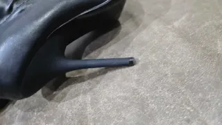 Botas altas de tacón negro