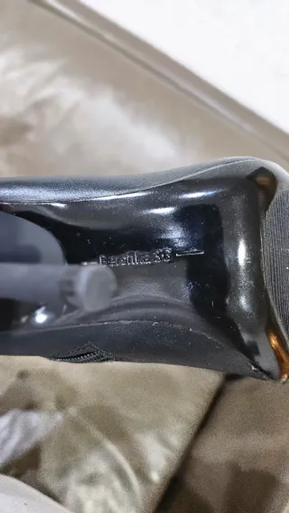 Botas altas de tacón negro