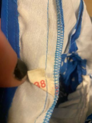 Traje de flamenca azul con lunares blancos