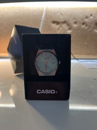 Reloj Casio Esfera Turquesa y Correa Plateada