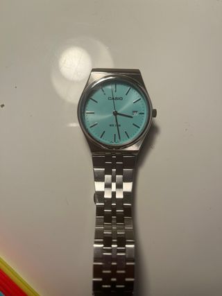 Reloj Casio Esfera Turquesa y Correa Plateada