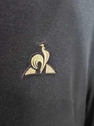 Blusa Coq Sportif Negra Espalda Abierta