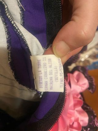 Traje de flamenca volantes morado y rosa