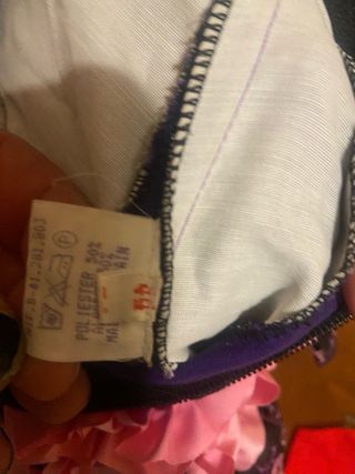 Traje de flamenca volantes morado y rosa