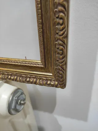 Marco de fotos dorado vintage con cristal.