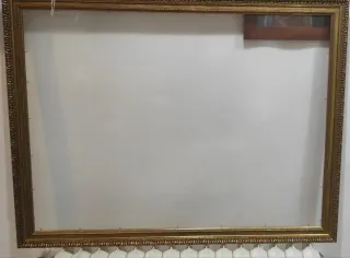 Marco de fotos dorado vintage con cristal.