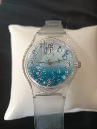 Orologio trasparente con bolle