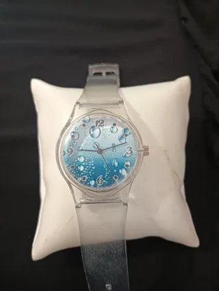 Orologio trasparente con bolle