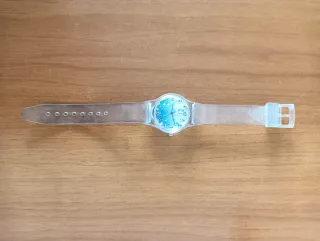 Orologio trasparente con bolle