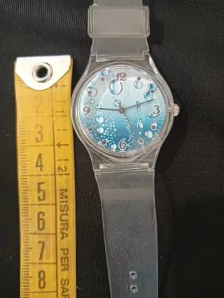 Orologio trasparente con bolle