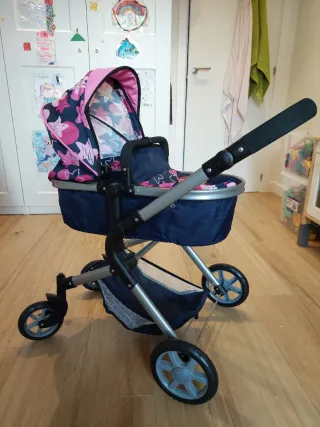 Carrito de muñecas rosa y azul