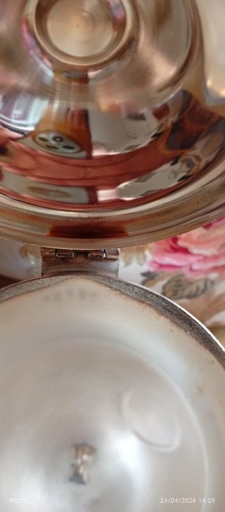 Tetera antigua de plata