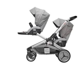 Carrito gemelar con dos sillas de coche