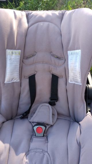 Carrito gemelar con dos sillas de coche