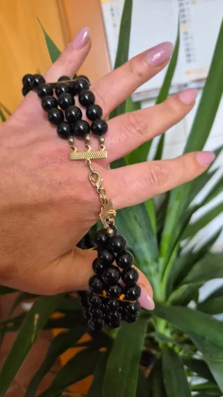Collana perle nere con dettaglio oro