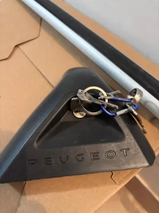 Barras de techo Peugeot originales con llave