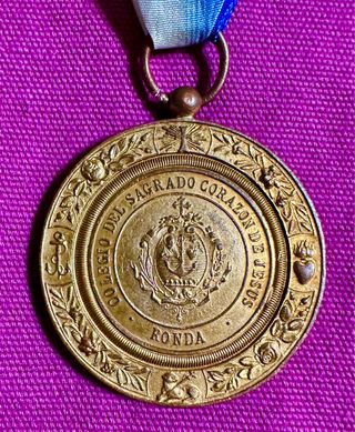 Antigua medalla escolar colegio Sagrado Corazón.