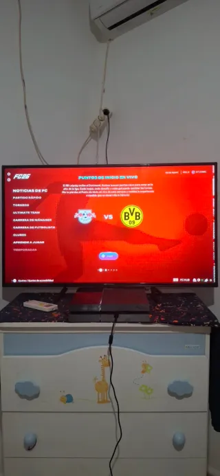 PS4 (PlayStation 4) con FIFA 26