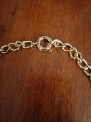 Collana con ciondolo blu e oro