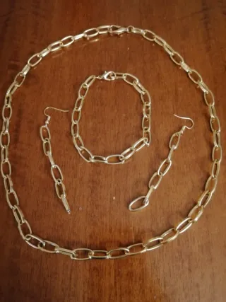 Set collana, bracciale e orecchini oro