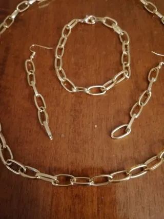 Set collana, bracciale e orecchini oro