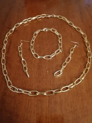 Set collana, bracciale e orecchini oro