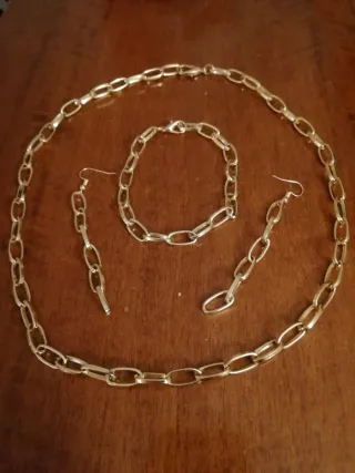 Set collana, bracciale e orecchini oro