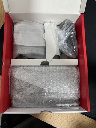 Nintendo Switch OLED + Mario Kart 8 Deluxe + Funda