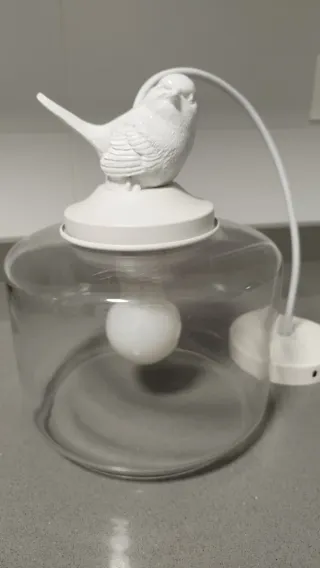 Lámpara de techo con pájaro