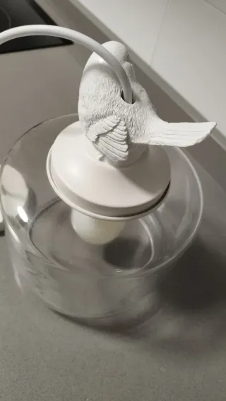 Lámpara de techo con pájaro