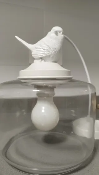 Lámpara de techo con pájaro