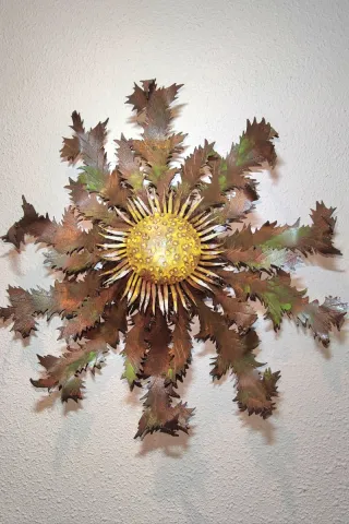 Eguzkilore decorativo in metallo fatto a mano