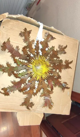 Eguzkilore decorativo in metallo fatto a mano