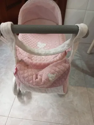 Carrito de muñecas rosa