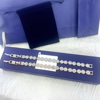 Bellissimo bracciale stile "Tennis" con punti luce