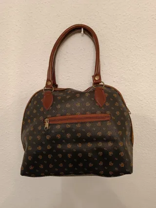Bolso de mano marrón y negro pollini